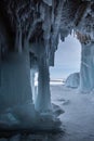 Ice cave, Icicles in the rocky caves, Lake Baikal in winter, Siberia