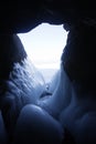 Icicles in cave. Lake Baikal, Oltrek island. Winter landscape