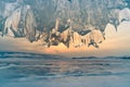 Ice cave with sunset, Baikal water lake Russia