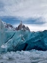 Ice cavern in glacier and Cerro Torre behind Royalty Free Stock Photo