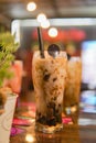 ice choco coffee caramel messes with straw and spoon Royalty Free Stock Photo