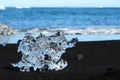 Ice Chunk Scattered on Black Sand at Diamond Beach in Iceland Royalty Free Stock Photo