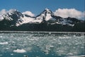 Ice Chunks Floating in Ocean near Mountains of Seward Alaska Royalty Free Stock Photo