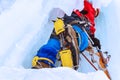 Ice climber on a vertical wall of a frozen waterfall, bottom up view