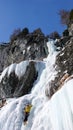 Ice climbing in the Swiss Alps on a gorgeous winter day Royalty Free Stock Photo