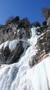 Ice climbing in the Swiss Alps on a gorgeous winter day