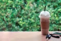 Ice coffee , Key and smartphone in cafe Royalty Free Stock Photo
