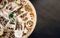 Ice coffee in a plasstic glass with straw