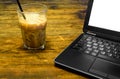 Ice coffee on wooden table Royalty Free Stock Photo