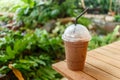 Ice coffee on a wooden table Royalty Free Stock Photo