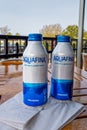 Ice cold aluminum bottles of Aquafina purified water