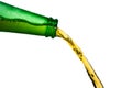 Ice cold beer pouring from green bottle. Stop action closeup on white Royalty Free Stock Photo
