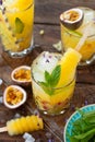 Ice cold cocktail with fresh passion fruit Royalty Free Stock Photo