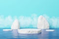 Ice cold cool fresh iceberg white float ocean blue stand product display platform advertisement mountain landscape winter season.