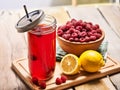 Ice cold drink glass with raspberry and lemon cocktail . Royalty Free Stock Photo