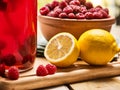 Ice cold drink glass with raspberry and lemon cocktail . Royalty Free Stock Photo