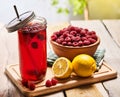 Ice cold drink jar glass with raspberry and lemon cocktail . Royalty Free Stock Photo