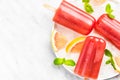 Ice cold refreshing red popsicles Royalty Free Stock Photo