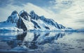 Ice covered mounts next to the ocean. Antarctica.