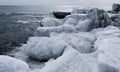 Ice-covered shore, rocks and coastal cliffs. The Black Sea is frozen Royalty Free Stock Photo