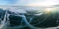 Ice crack at sunset in the ice of Lake Baikal at the on Olkhon Island. Cylindrical panorama 360 Royalty Free Stock Photo