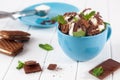 Ice cream balls covered with chocolate biscuits in cup over whit Royalty Free Stock Photo