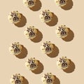 Ice cream balls pattern with copy space on a pastel beige background. Summertime, dessert minimal concept. Top view. Snickers ,