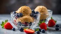 ice cream balls with strawberries, blueberries in glass bowls menudessert Royalty Free Stock Photo