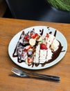 Ice cream, banana, strawberry, chocolate waffles with chocolate Royalty Free Stock Photo