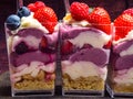 Ice cream, berries, strawberry, blueberry, raspberry, pistachios, nuts, sorbet, jam and biscuit, summer dessert, sweet snack