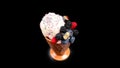 Ice cream with blueberries, blackberries and raspberries on a black background.  Copy space Royalty Free Stock Photo