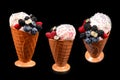 Ice cream with blueberries, blackberries and raspberries on a black background.  Copy space Royalty Free Stock Photo