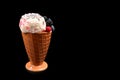 Ice cream with blueberries, blackberries and raspberries on a black background.  Copy space Royalty Free Stock Photo