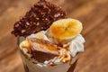 Ice cream chocolate cocktail in glass with syrup and banana Royalty Free Stock Photo