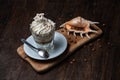 Ice cream with coffee, Affogato al Caffe Frappe with shell on the dark table.