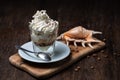 Ice cream with coffee, Affogato al Caffe Frappe with shell on the dark table.