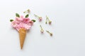 Ice Cream Cone with Bouquet of roses. Spring Summer Floral concept. Creative Minimal. Pink Blossom, white Color. Trendy Royalty Free Stock Photo