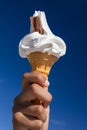 Ice Cream Cone with Chocolate Flake and Blue Sky Royalty Free Stock Photo