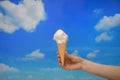 Ice cream cone and Cotton like Clouds Royalty Free Stock Photo