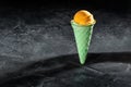 Ice cream cone on dark background