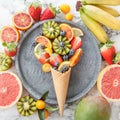 Ice cream cone with fresh fruits Royalty Free Stock Photo