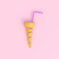 Ice cream cone sliced with pink drinking straws abstract minimal pink background, Food concept. Royalty Free Stock Photo