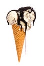 Ice cream: Ice cream cone with Stracciatella and much chocolate sauce isolated on white background