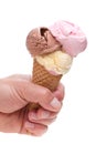 An ice cream cone with three different scoops of ice cream Royalty Free Stock Photo