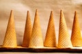 Ice cream cones against beige background Royalty Free Stock Photo