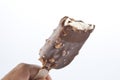 Ice cream covered with chocolate and almonds. Royalty Free Stock Photo