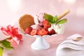 Ice cream cup with strawberries and cream Royalty Free Stock Photo