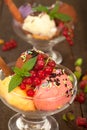 Ice cream dessert in two glass bowls, vertical Royalty Free Stock Photo