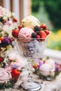 Ice cream desserts buffet table, event food catering for wedding, party and holiday celebration, ice creams and flowers decor in a Royalty Free Stock Photo