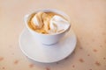 Ice cream in an espresso coffee called an affogato coffee in a white cup and saucer Royalty Free Stock Photo